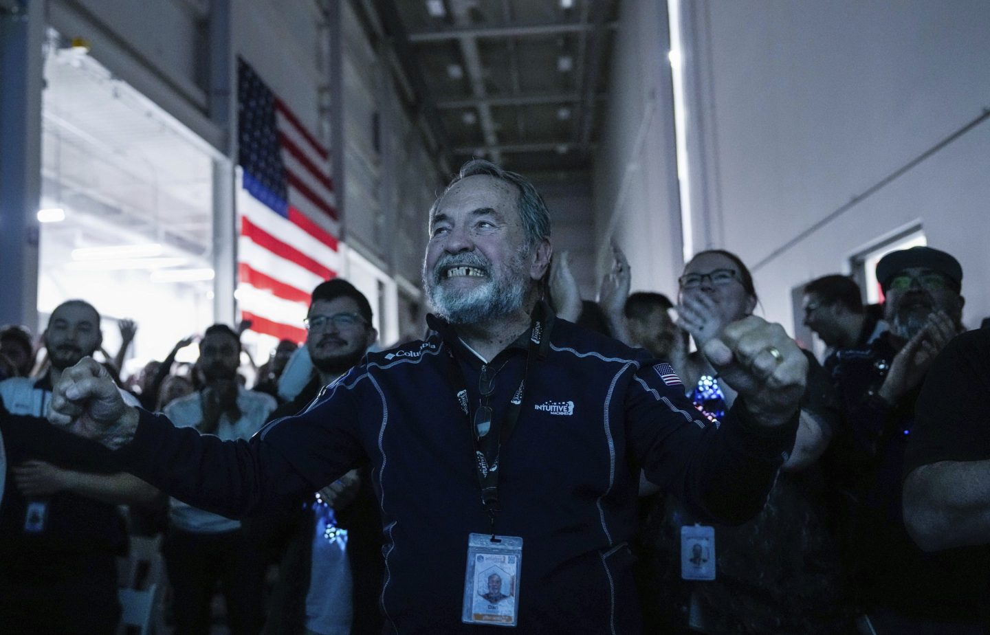 Main Engine Control Computer designer for Intuitive Machines Dan Harrison cheers amongst fellow employees during a watch party moments after they became the first commercial company to softly land on the moon on Feb. 22, 2024, in Houston.