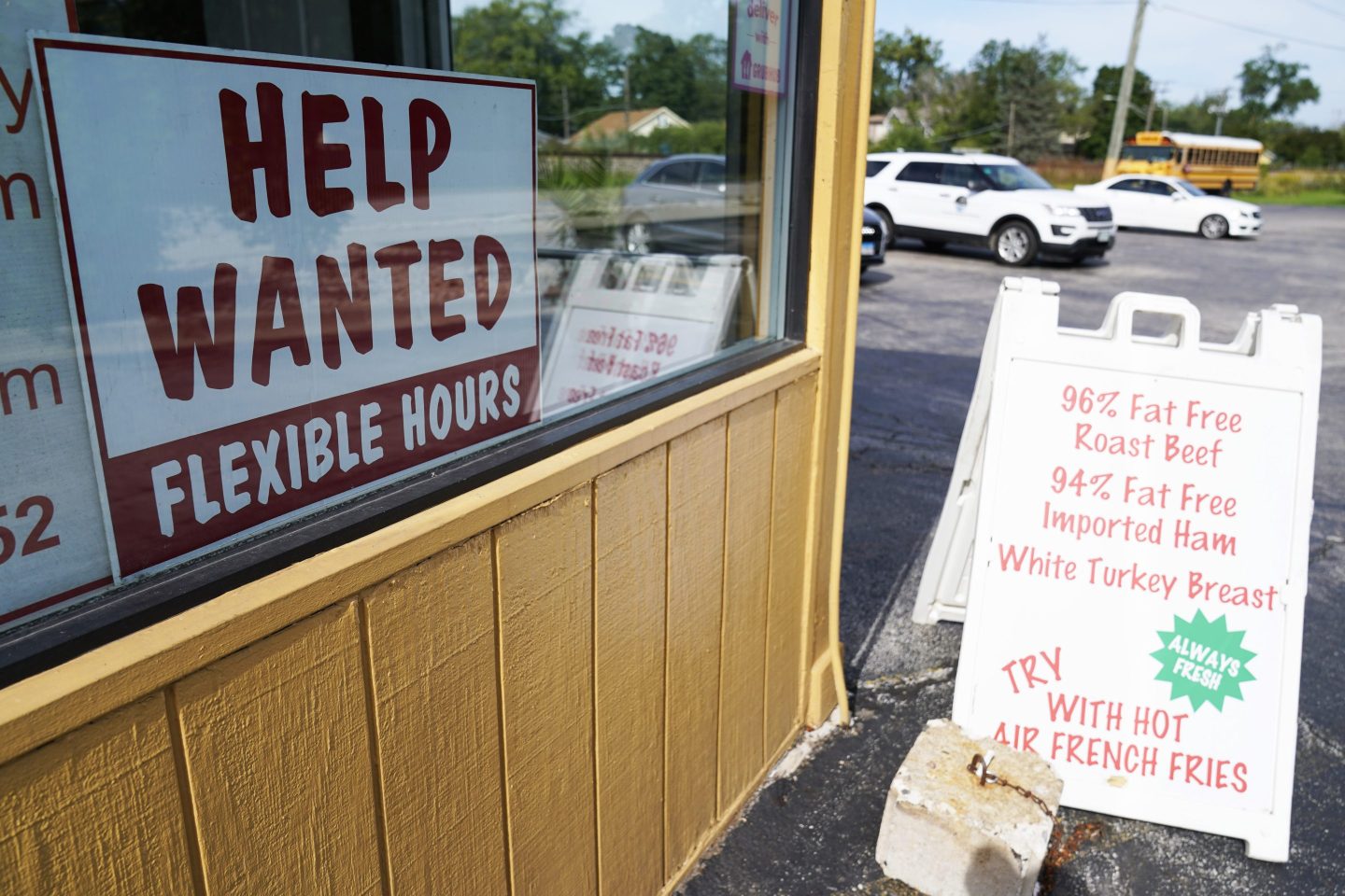 A "Help Wanted" sign is displayed in Deerfield, Ill., on Sept. 21, 2022.