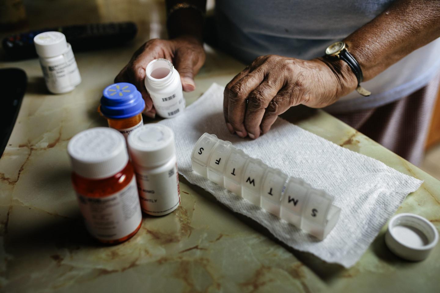 Patients see first savings from Biden’s drug price push, as Pharma lines up its lawyers