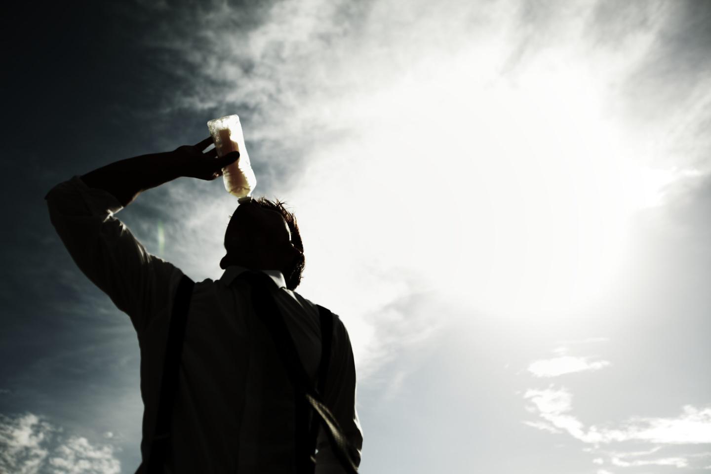 Businessman drinking water