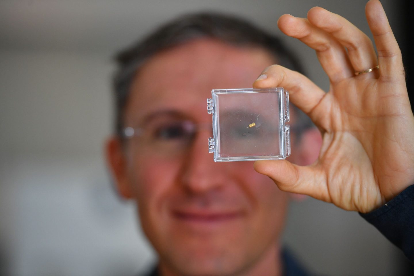 Bionaut Labs CEO and founder Michael Shpigelmacher with the medical micro-robot in 2022.