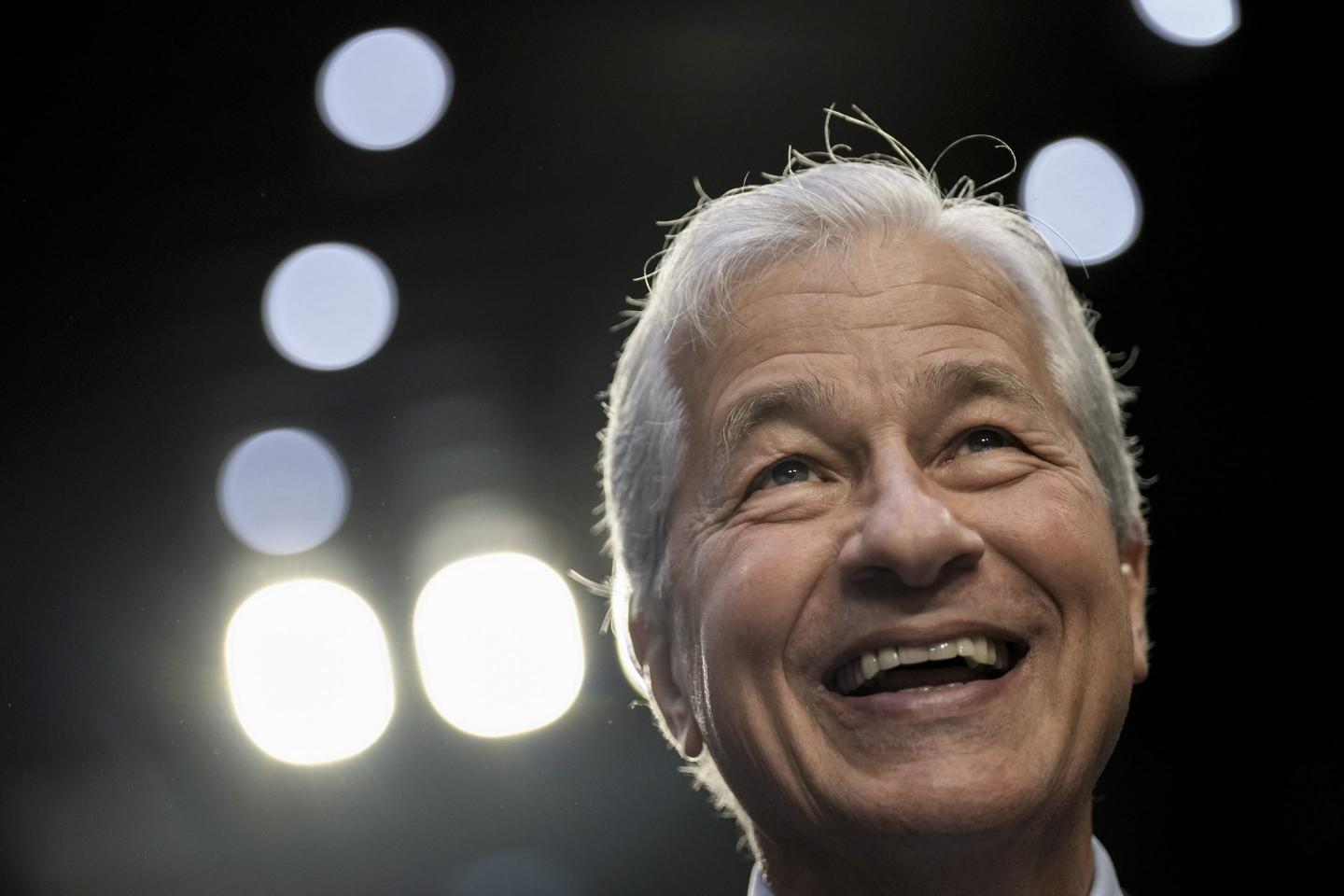 Jamie Dimon and his inner circle at JPMorgan offloaded nearly $170 million in stock as the bank’s share price hit a new high