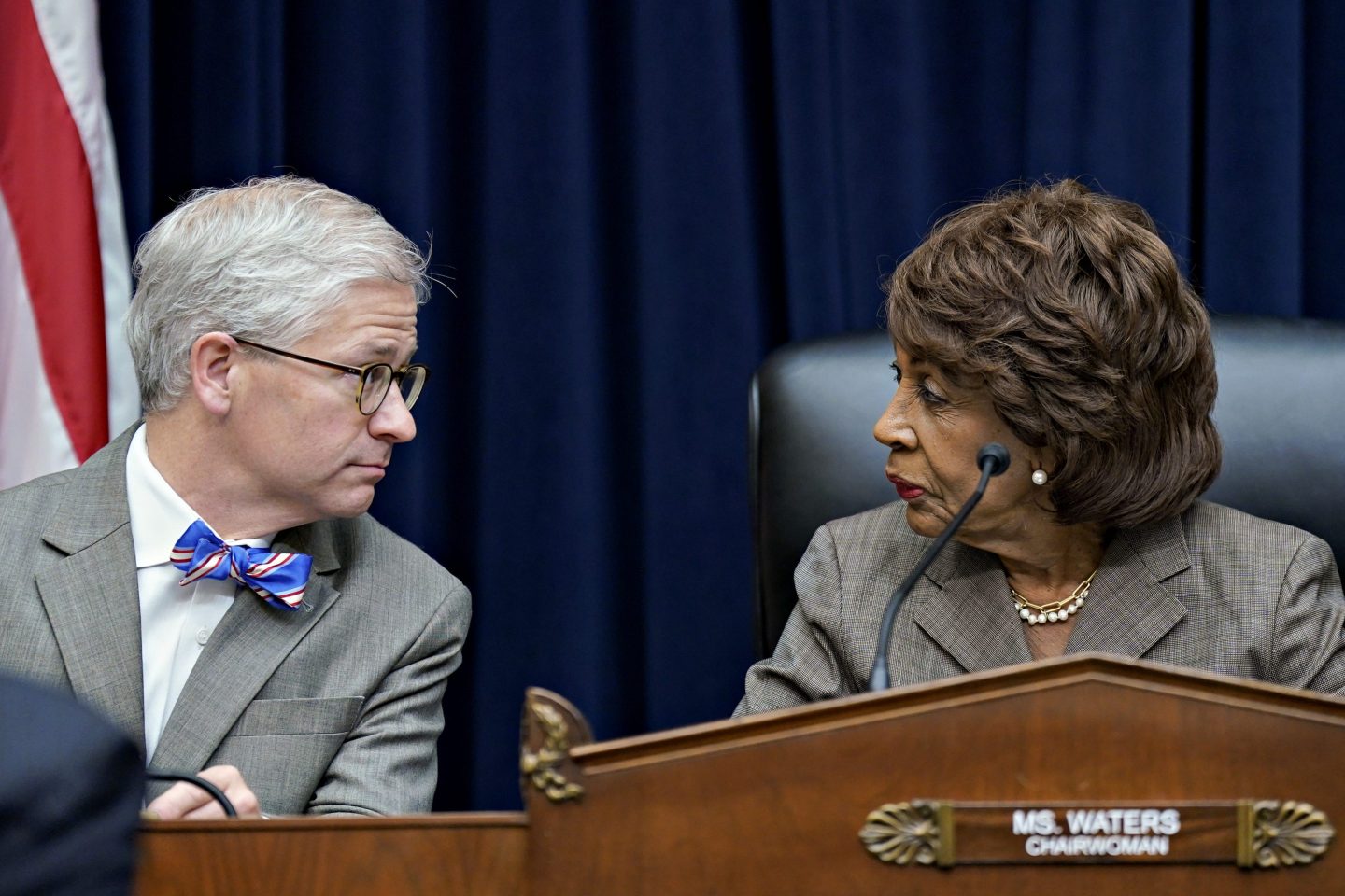 Rep. Maxine Waters, ranking member of the House Financial Services Committee (at right), with chair Patrick McHenry.