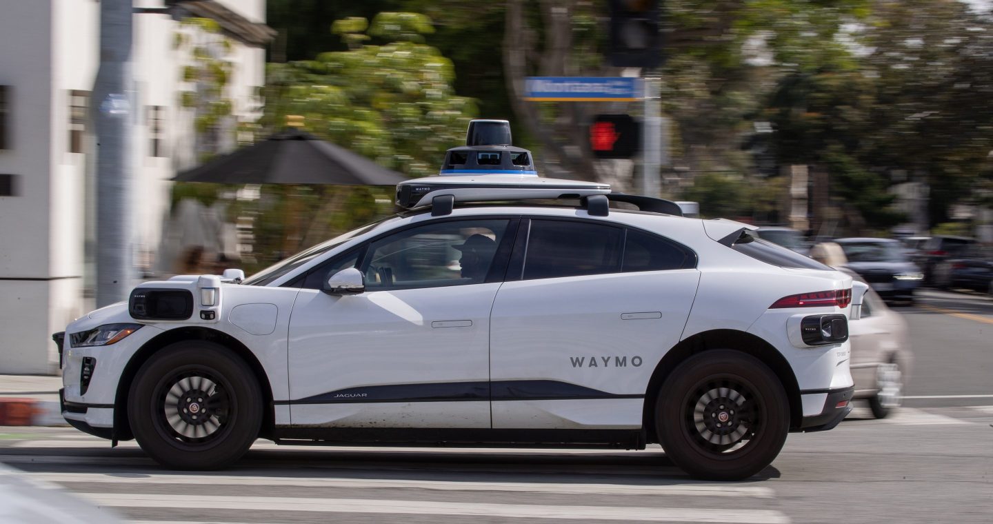 An electric Jaguar I-Pace outfitted with Waymo self-driving technology in Santa Monica, California.