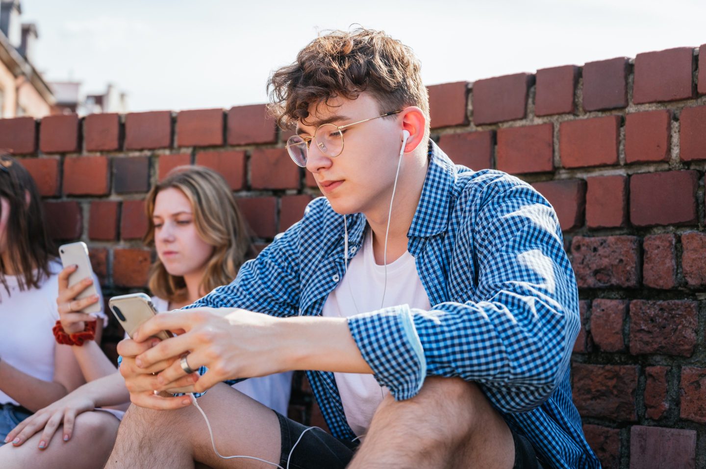 Young man looking at his phone