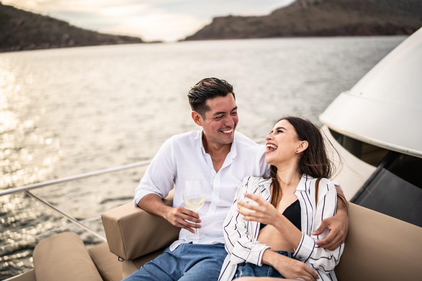 A millennial couple on a boat