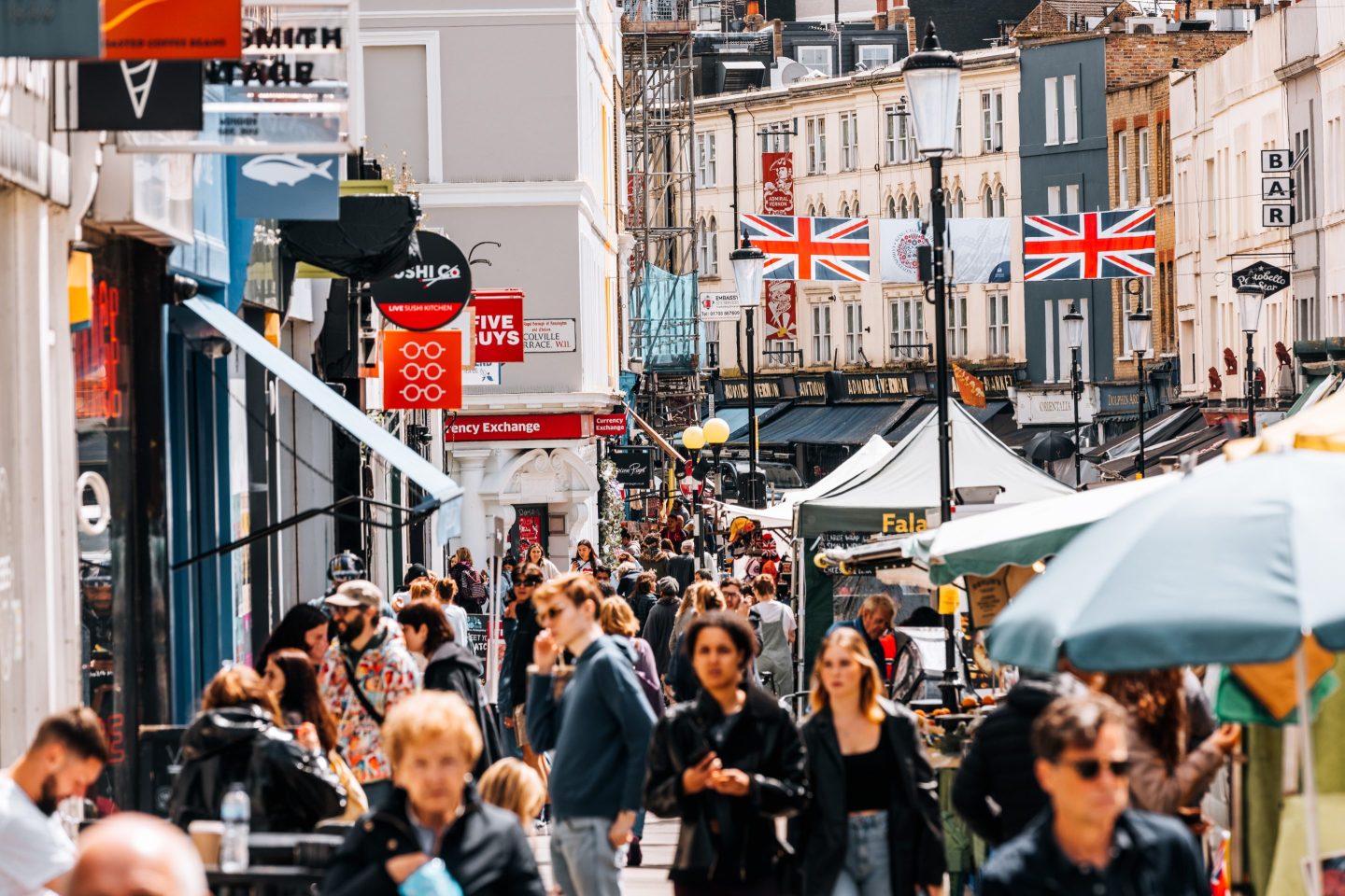 people walking on a busy street