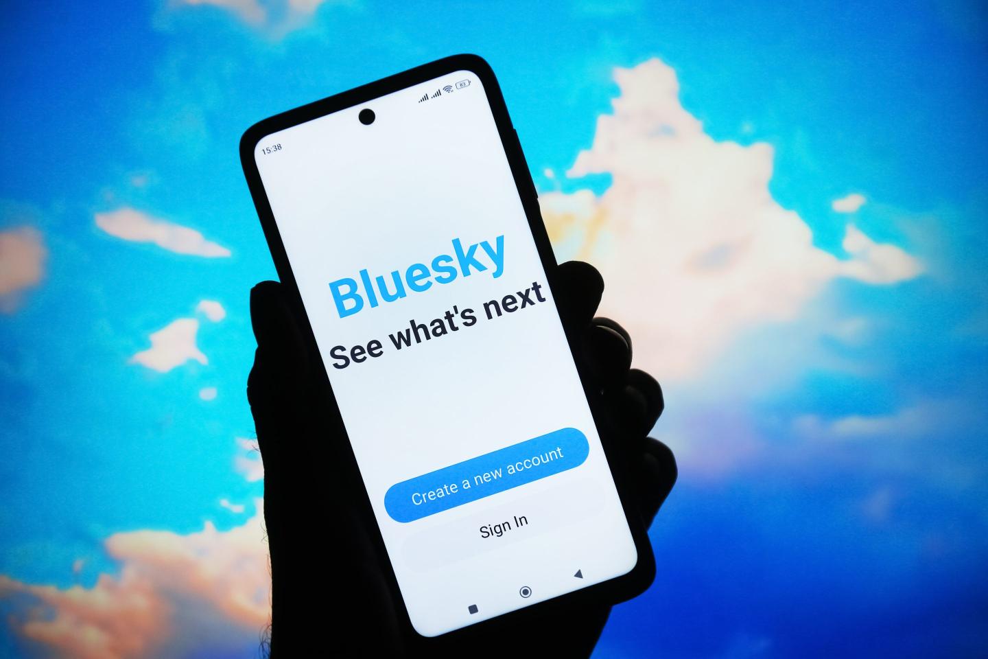 In this photo illustration, Bluesky Social logo of a social network is seen on a smartphone screen.