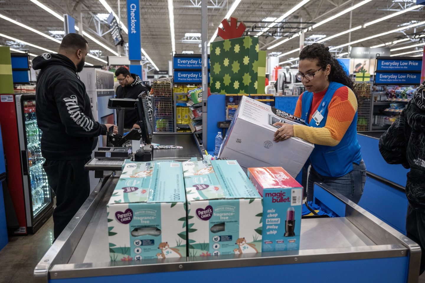 A shopper checks out at a Walmart store in Secaucus, N.J.