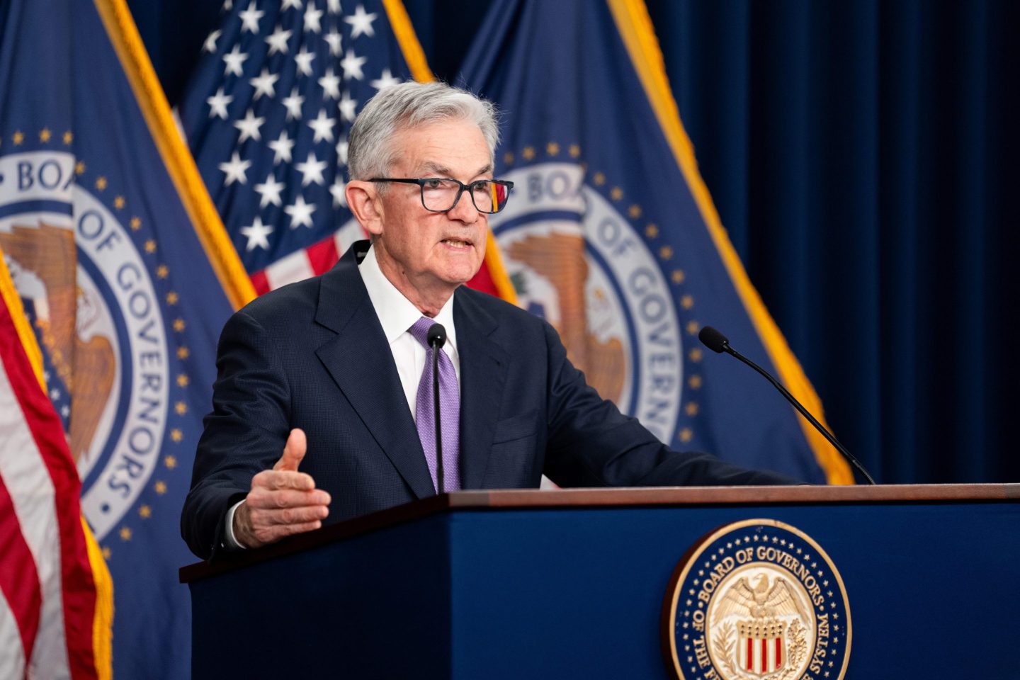 Fed chair Jerome Powell standing at a podium