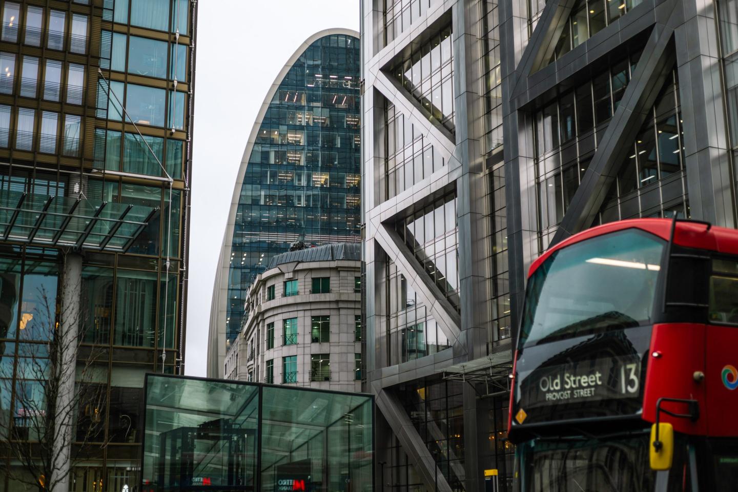 A bus passes Liverpool Street railway station in the City of London, UK.