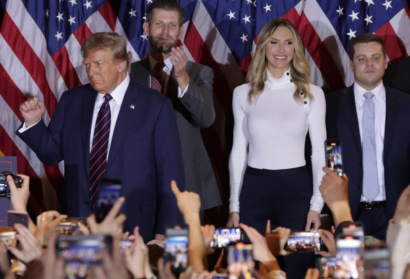 Republican presidential candidate and former U.S. President Donald Trump delivers remarks alongside Eric and Lara Trump during his primary night rally at the Sheraton on Jan. 23, 2024 in Nashua, New Hampshire.