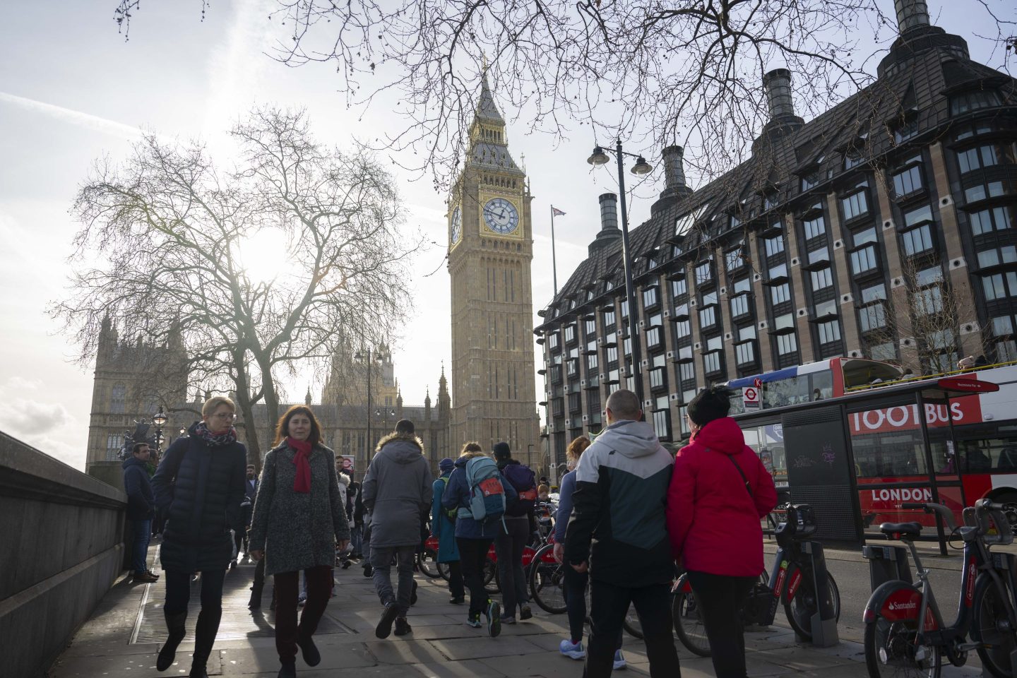 people walking on a busy street in London