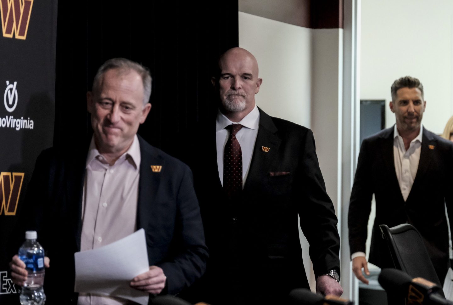 Washington Commanders Head Coach Dan Quinn, Managing Partner Josh Harris and GM Adam Peters arrive to a press conference at Commanders Park on February 5th.