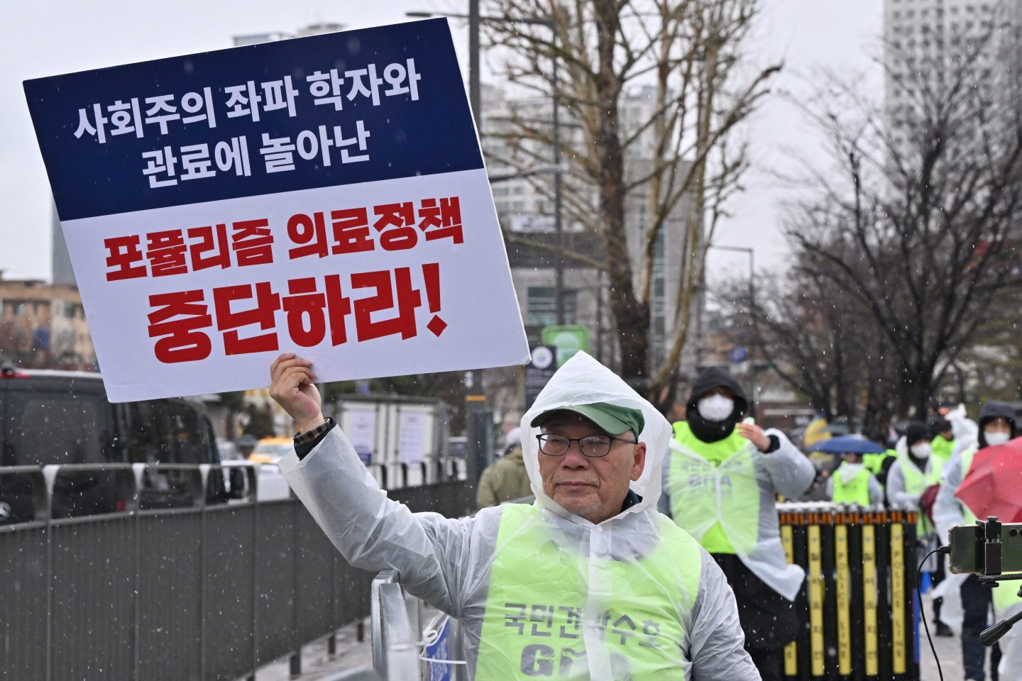 Over 60% of South Korean trainee doctors are refusing to go to work, causing operations to be delayed due to staffing shortages. 
