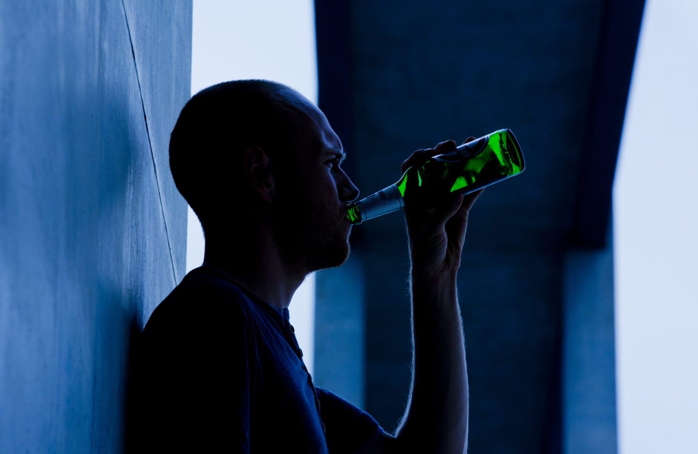 A young man is seen drinking from a beer bottle on Aug. 13, 2014, in Berlin, Germany. Global cancer diagnosis rates are expected to rise 77% to 35 million by 2050, fueled by aging, obesity, and tobacco and alcohol use, according to the World Health Organization.