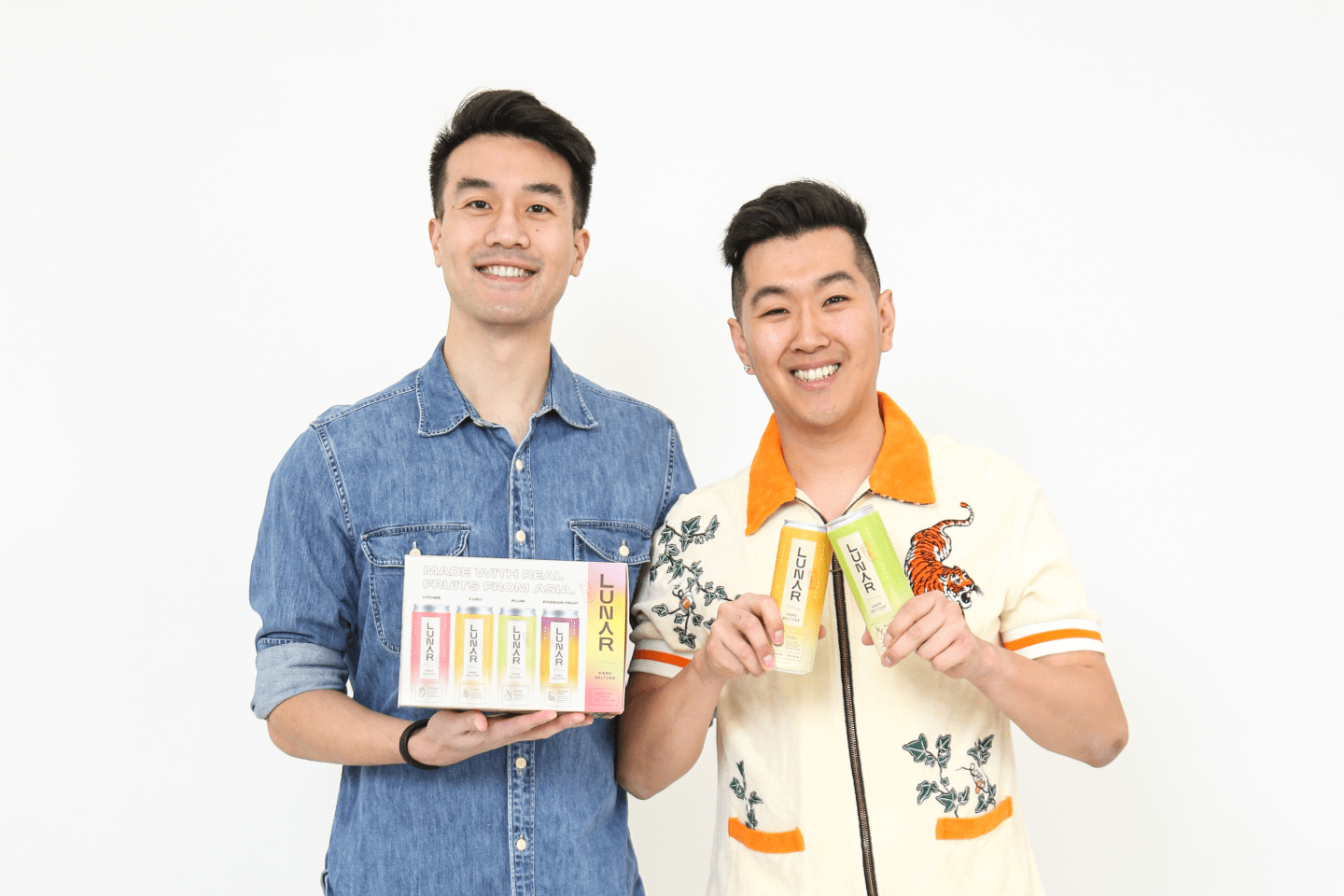 Kevin Wong and Sean Ro posing with Lunar Hard Seltzer.