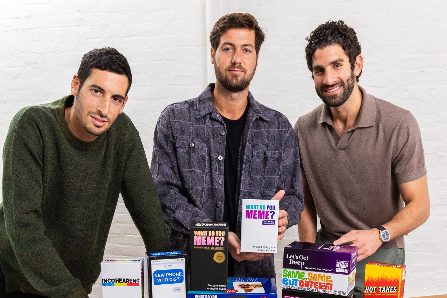 Relatable cofounders Elliot Tebele, Ben Kaplan and Elie Ballas pose with their products.