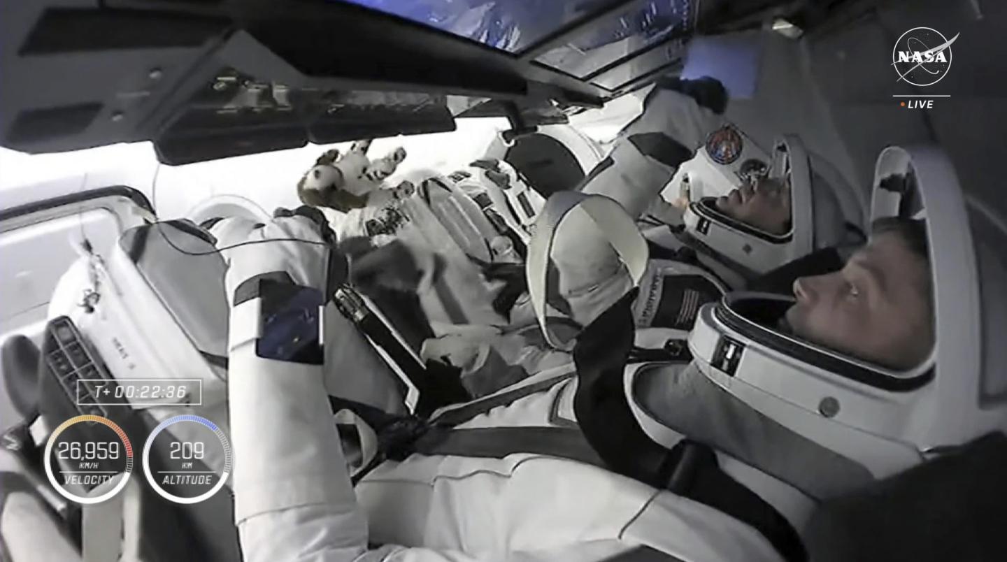 Astronauts inside SpaceX capsule