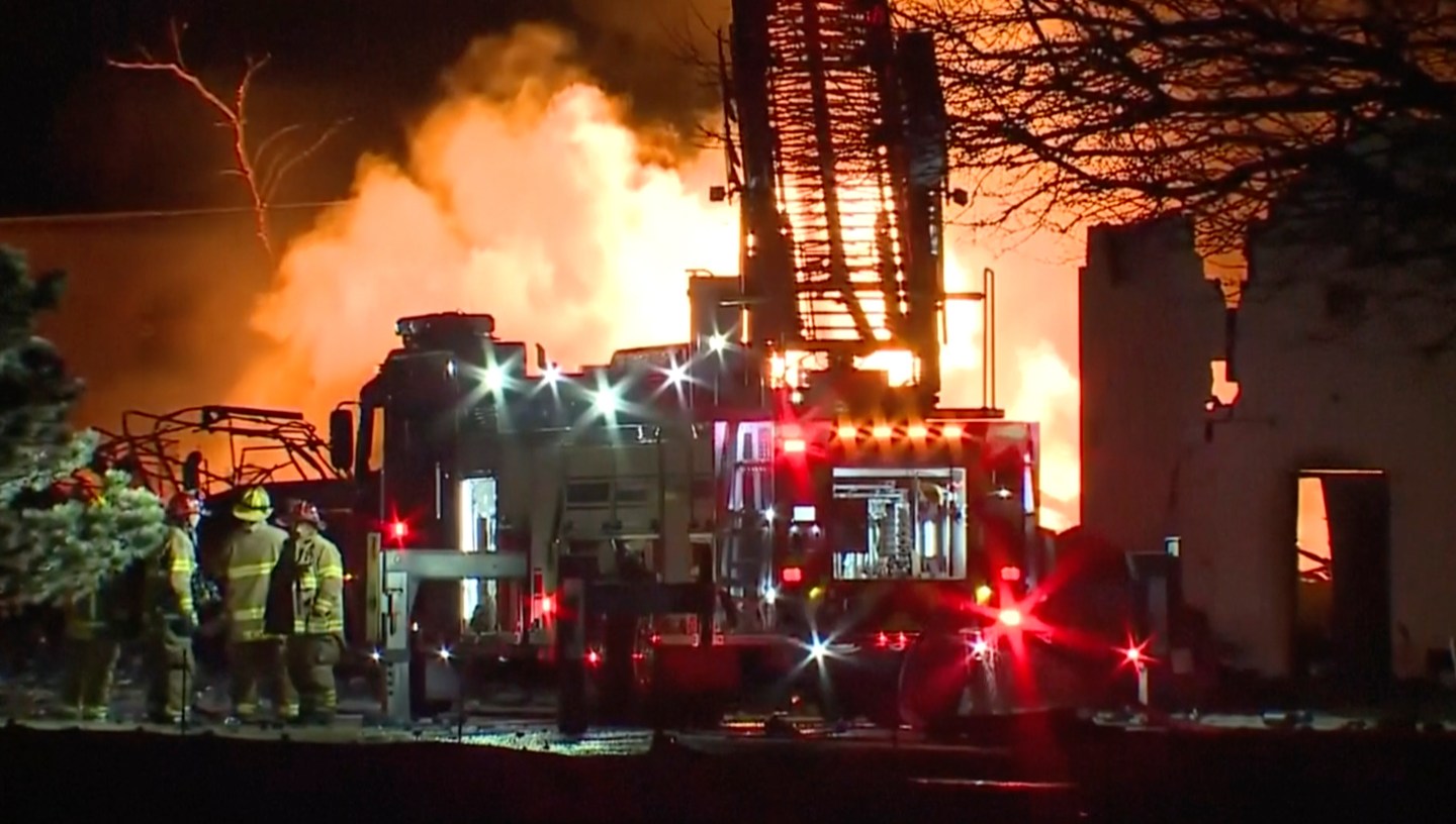 Firefighters battle an industrial fire in the Detroit suburb of Clinton Township, on March 4, 2024.