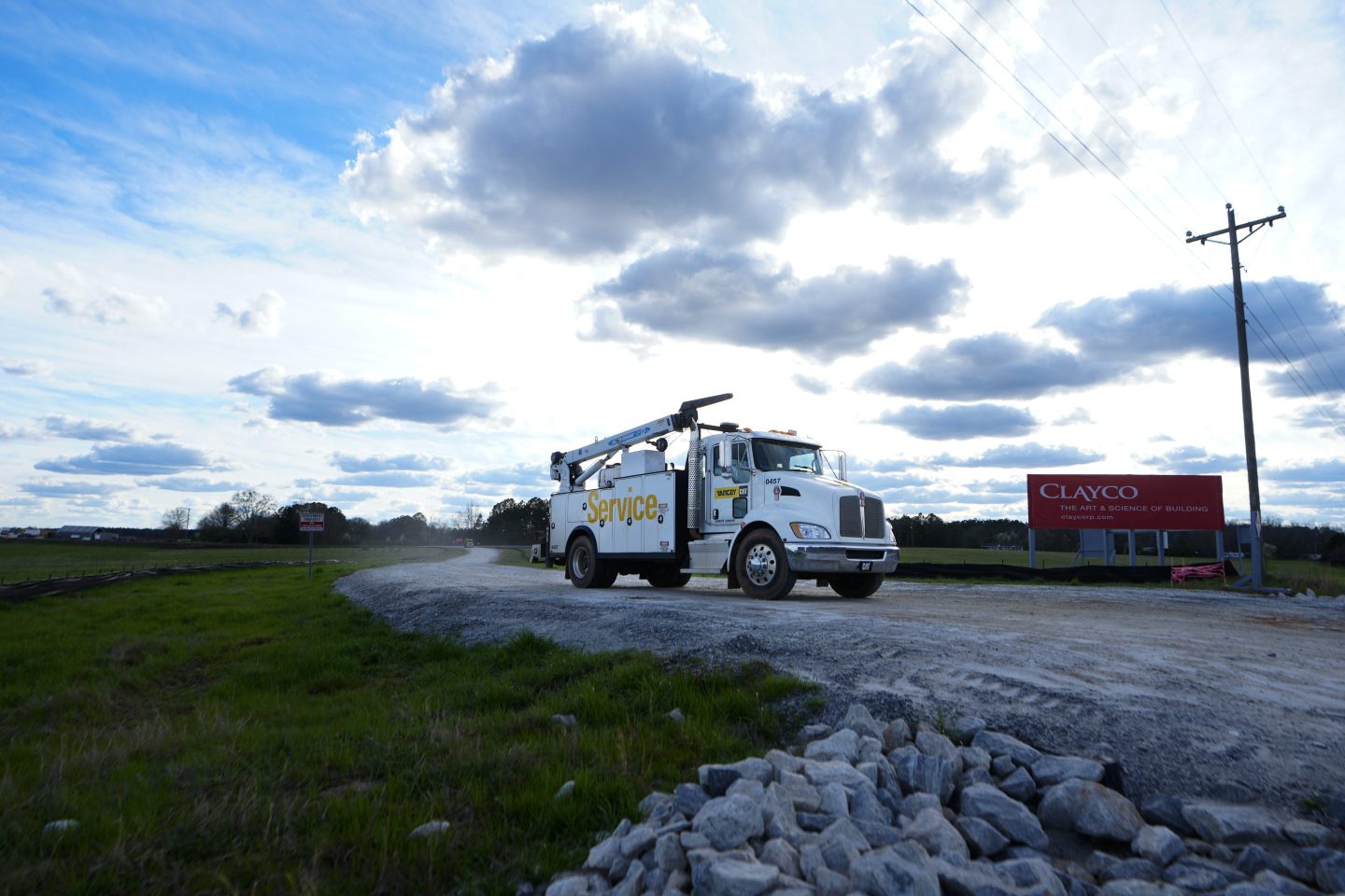 A truck leaves the site of a planned Rivian electric truck plant on March 7, 2024, in Rutledge, Ga.