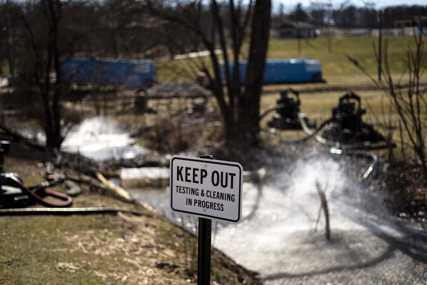 Cleanup of a creek underway in the aftermath of a train derailment in East Palestine, Ohio, on March 8, 2023.