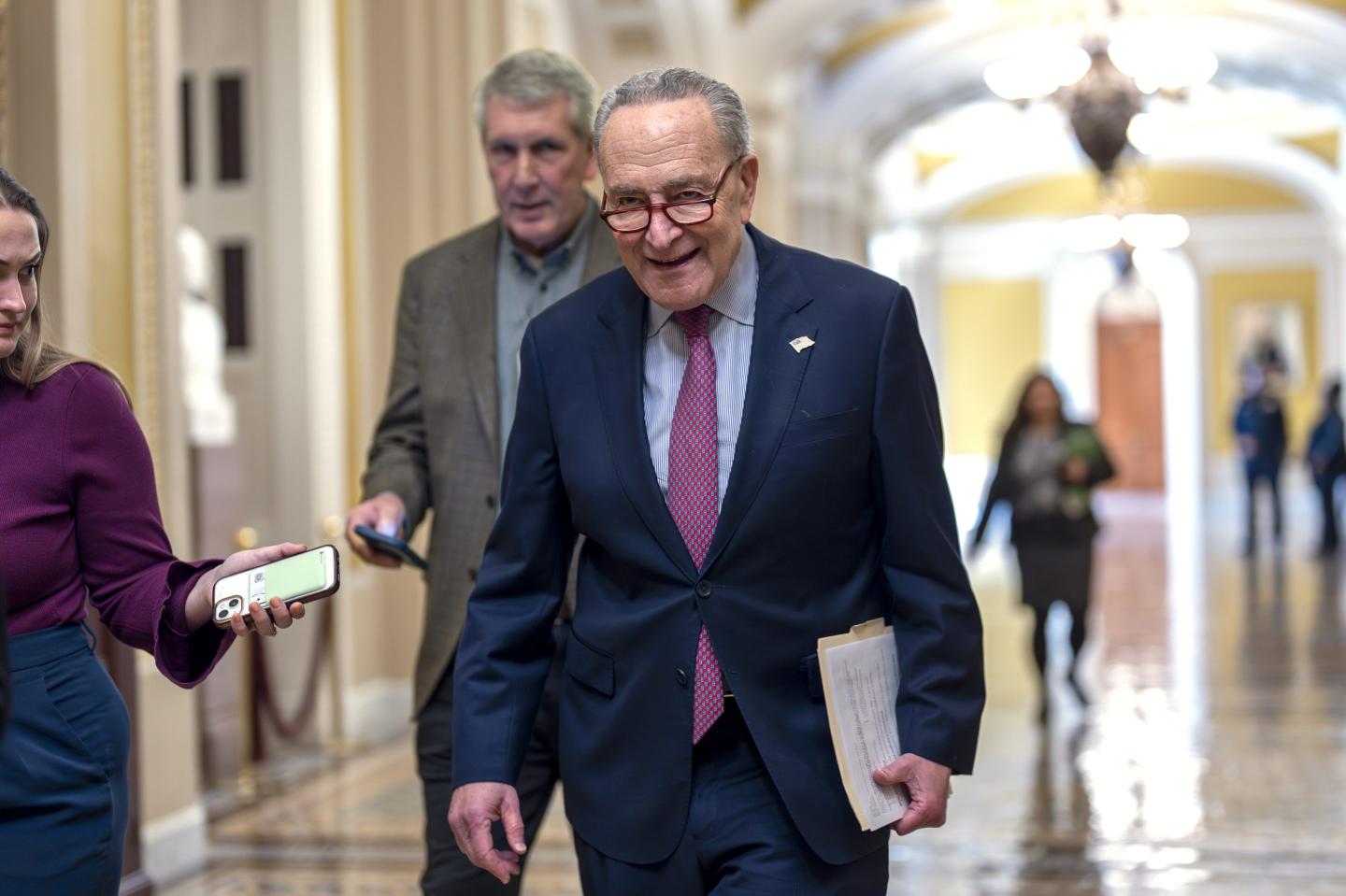 Biden signs $460 billion spending bills package, averting a partial government shutdown