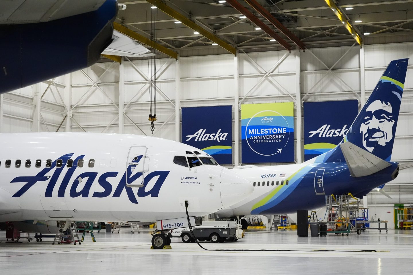 Alaska Airlines aircraft sit in the airline's hangar at Seattle-Tacoma International Airport.