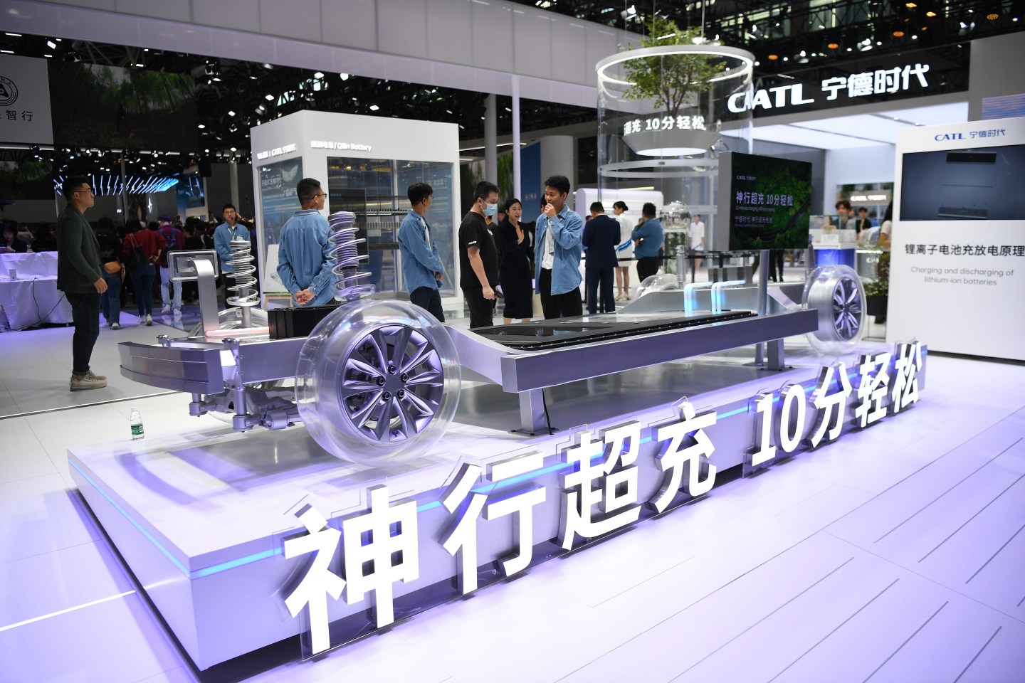People visit the booth of Contemporary Amperex Technology Co. at the Guangzhou International Automobile Exhibition.