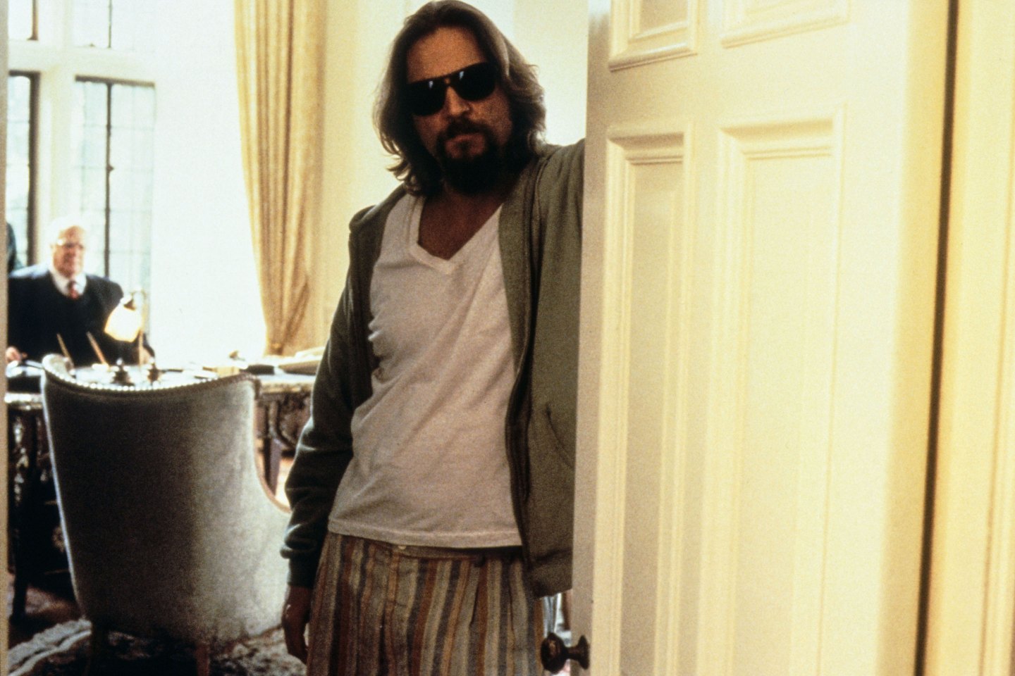 a man standing by a door