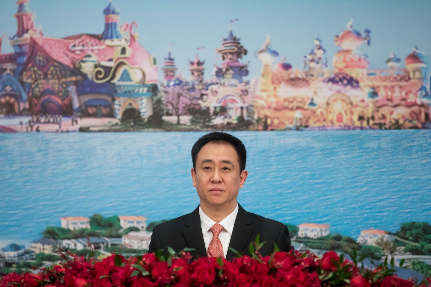 Hui Ka Yan, chairman of China Evergrande Group, pauses during a news conference in Hong Kong on March 26, 2019.