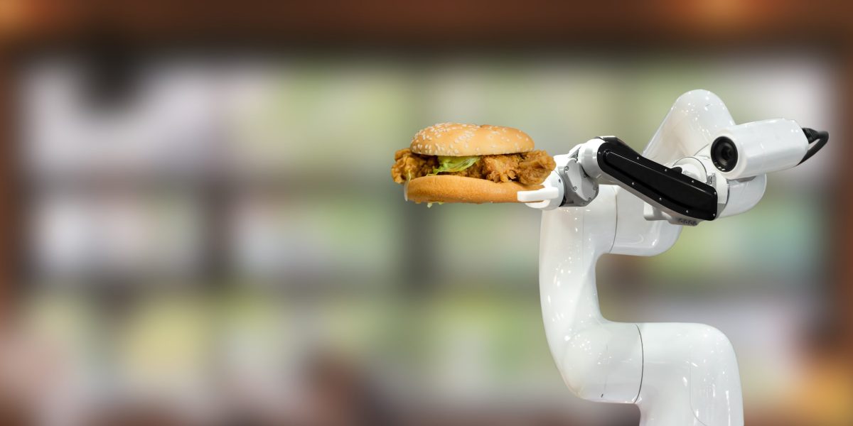 These fast-food workers are earning $25 an hour with paid vacation&mdash;as long as they work alongside a giant burger-slinging robot arm