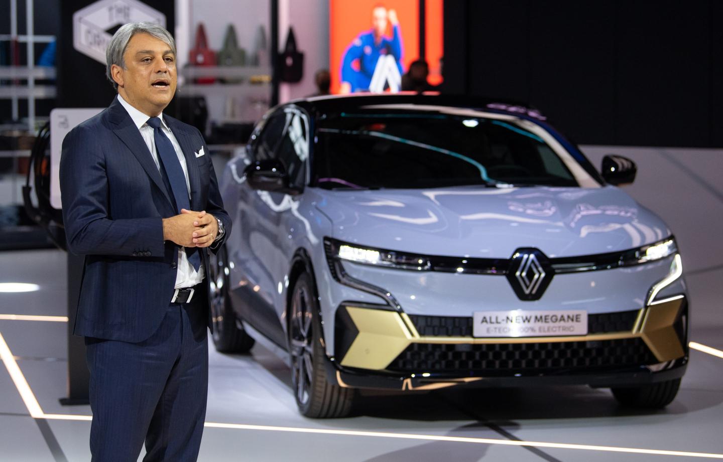 Luca de Meo, CEO of Renault, presents the "Megane E-Tech" at the Renault stand before the start of the International Motor Show