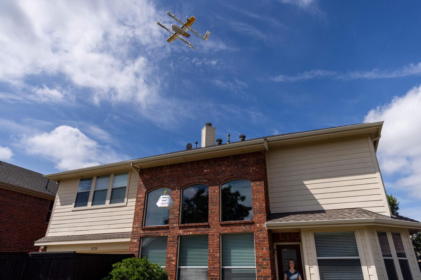 Drone flying over a house