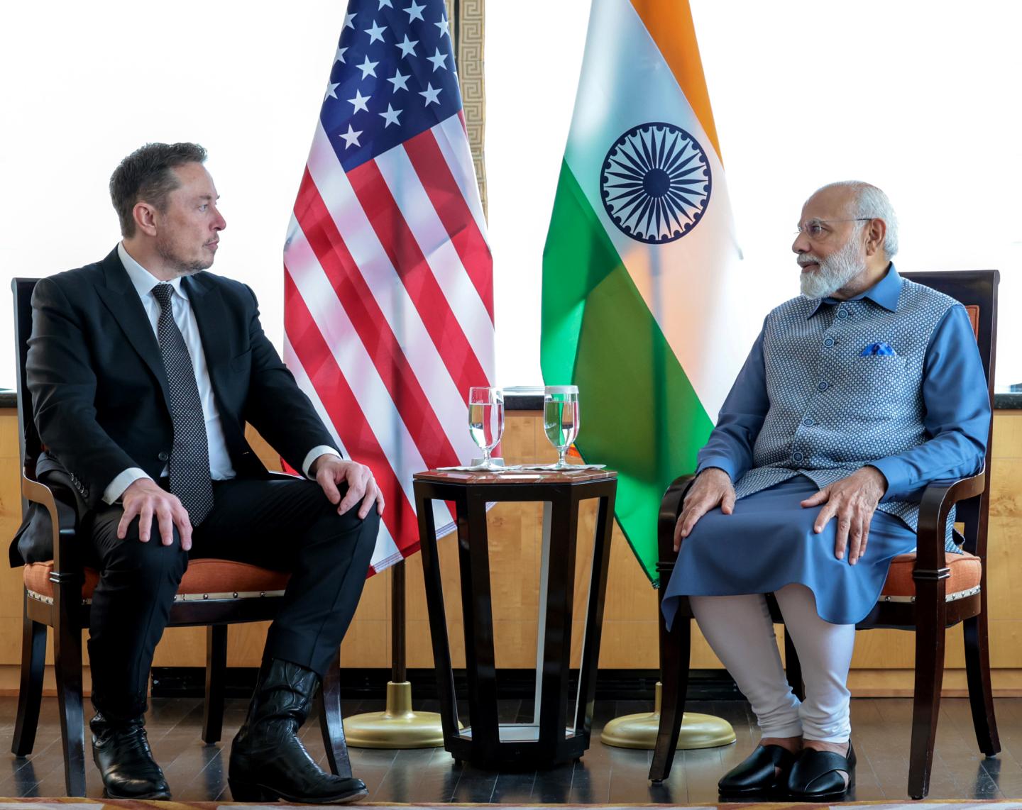 Indian Prime Minster Narendra Modi and Tesla CEO Elon Musk talking.