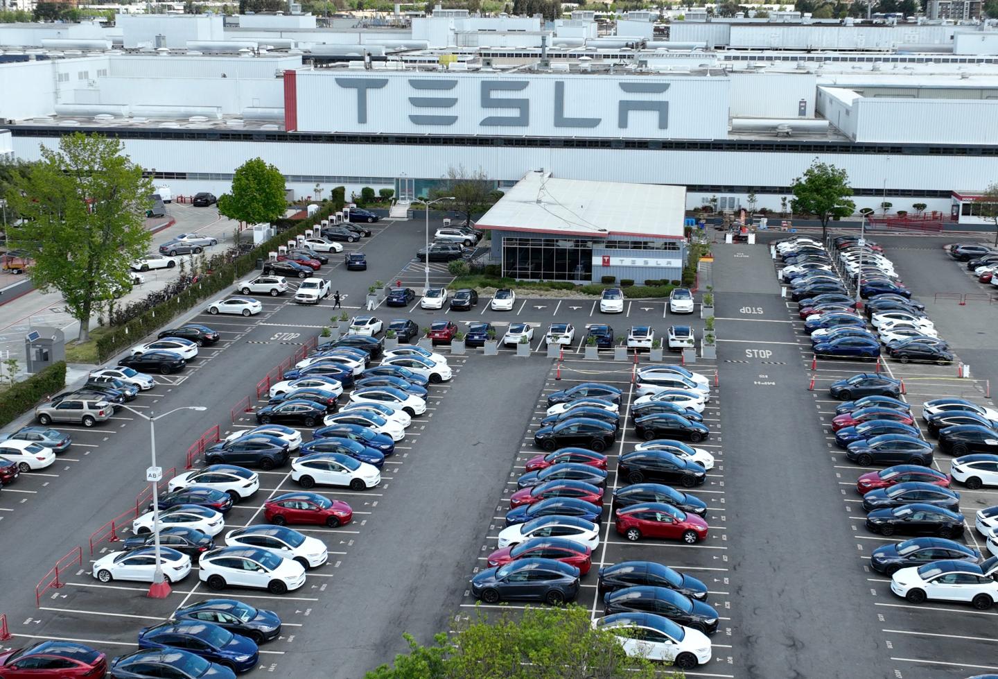 Tesla settles discrimination case with ex-employee who alleges Elon Musk’s EV maker allowed him to be subjected to racial epithets 