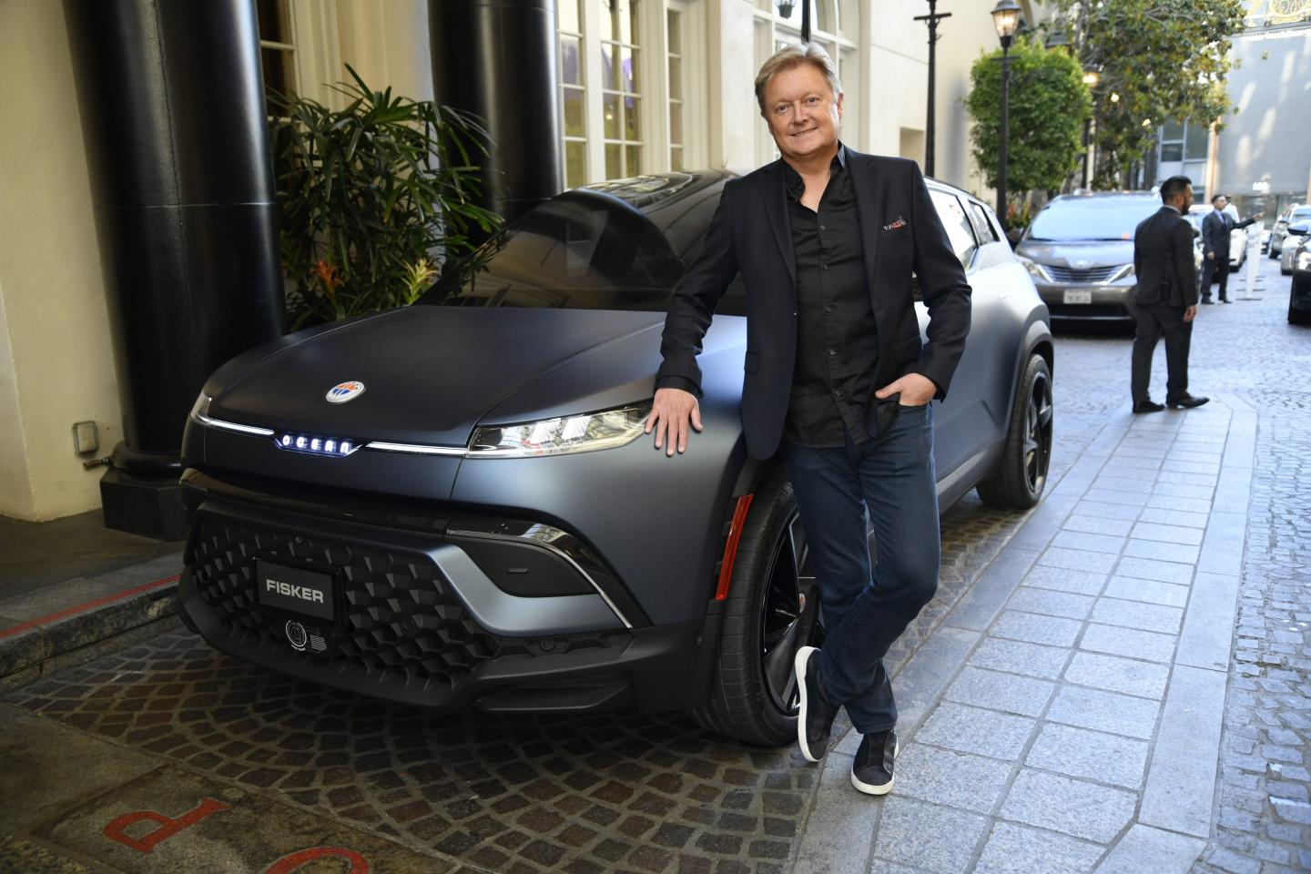 Car designer Henrik Fisker poses with a Fisker Ocean automobile at the Salvation Army California South Division's annual Sally Awards at Four Seasons Hotel Los Angeles at Beverly Hills on June 10, 2022 in Los Angeles, California.