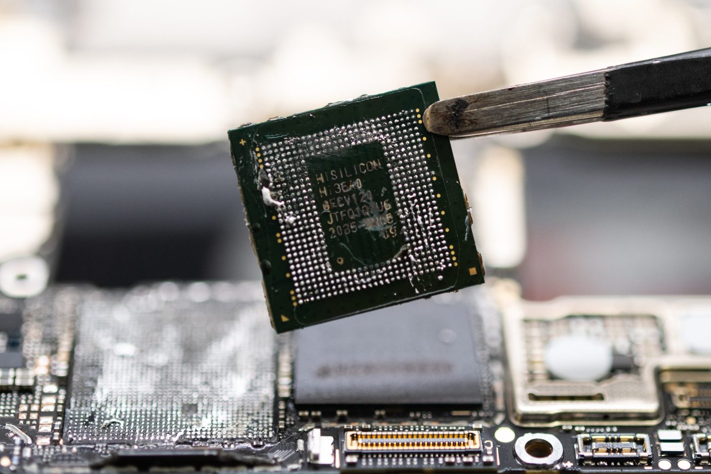 A Kirin 9000s chip fabricated in China by SMIC taken from Huawei's Mate 60 Pro in a sign of China's progress in a nationwide push to circumvent U.S. export controls.