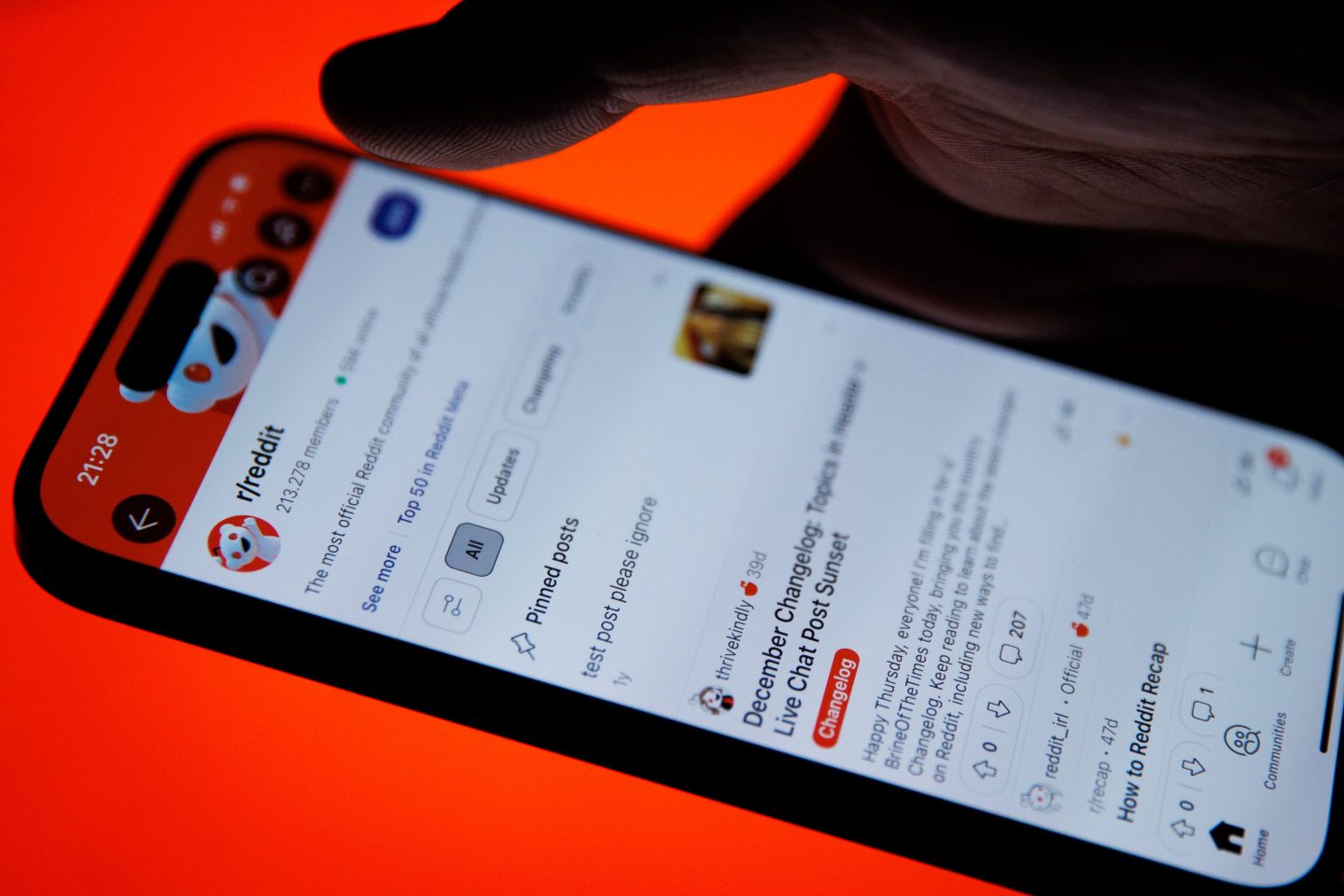 Photo illustration of Reddit interface