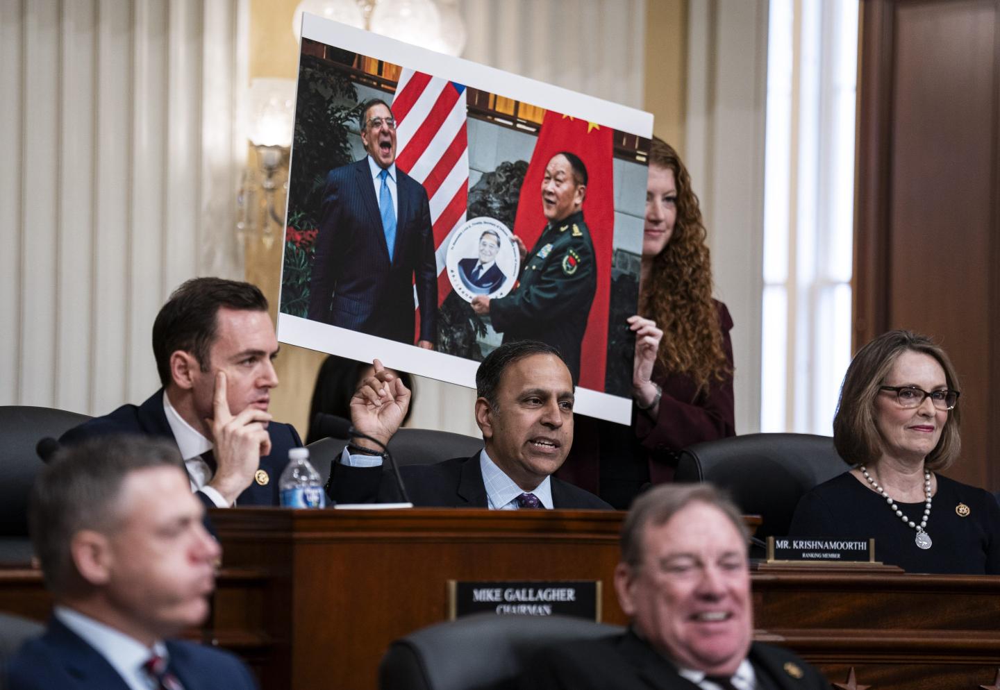 Raja Krishnamoorthi (D-Ill.) (background center) and Rep. Mike Gallagher (R-Wis.) (background left) co-sponsored a bill that could decide TikTok's fate in the U.S.
