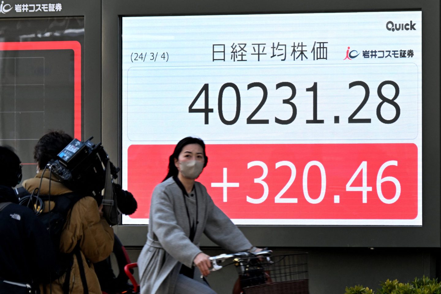 An electronic board displays a share price of the Nikkei index of the Tokyo Stock Exchange in Tokyo on March 4, 2024.