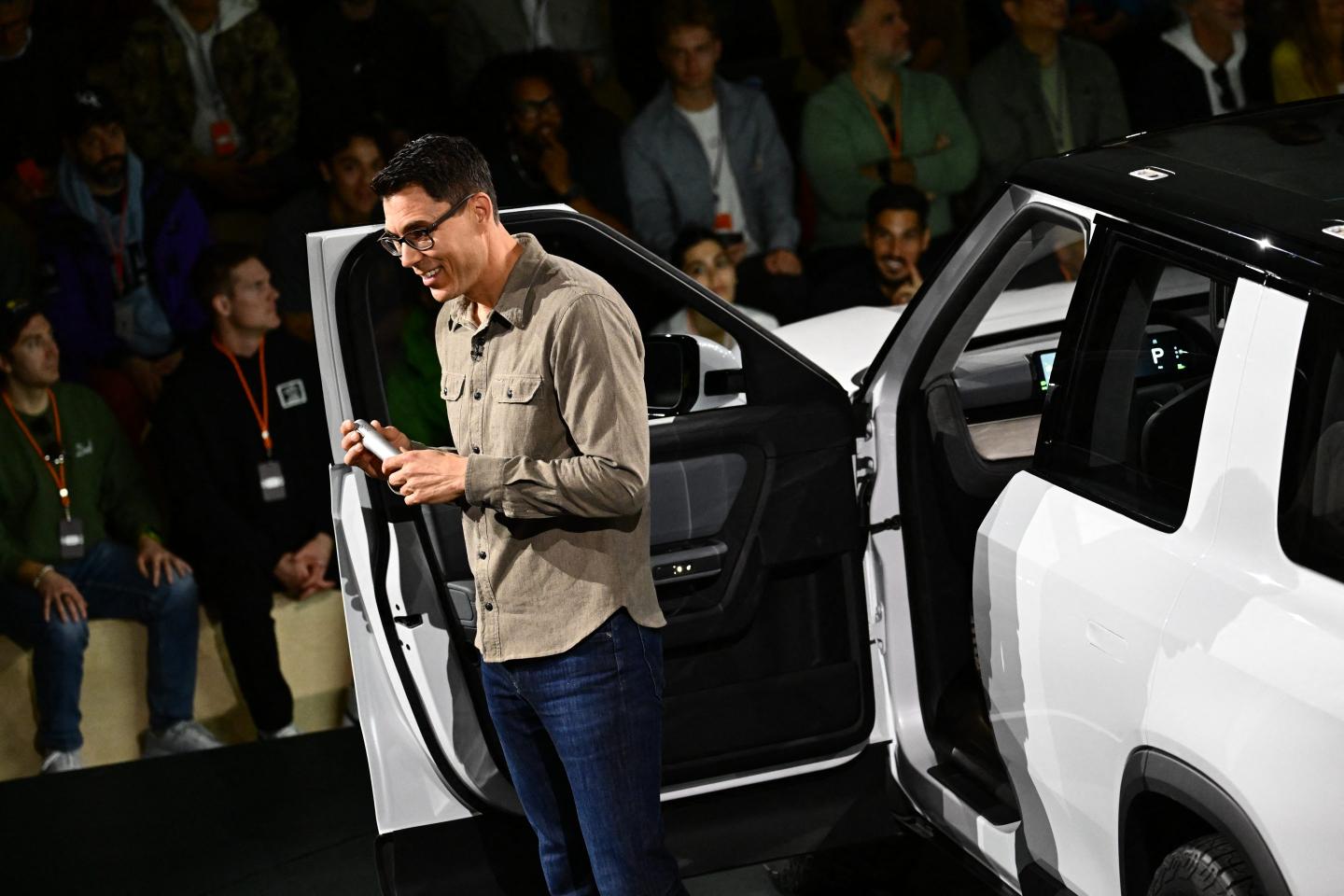 Rivian CEO Robert "RJ" Scaringe introduces the electric-vehicle maker's R2 SUV on Thursday.