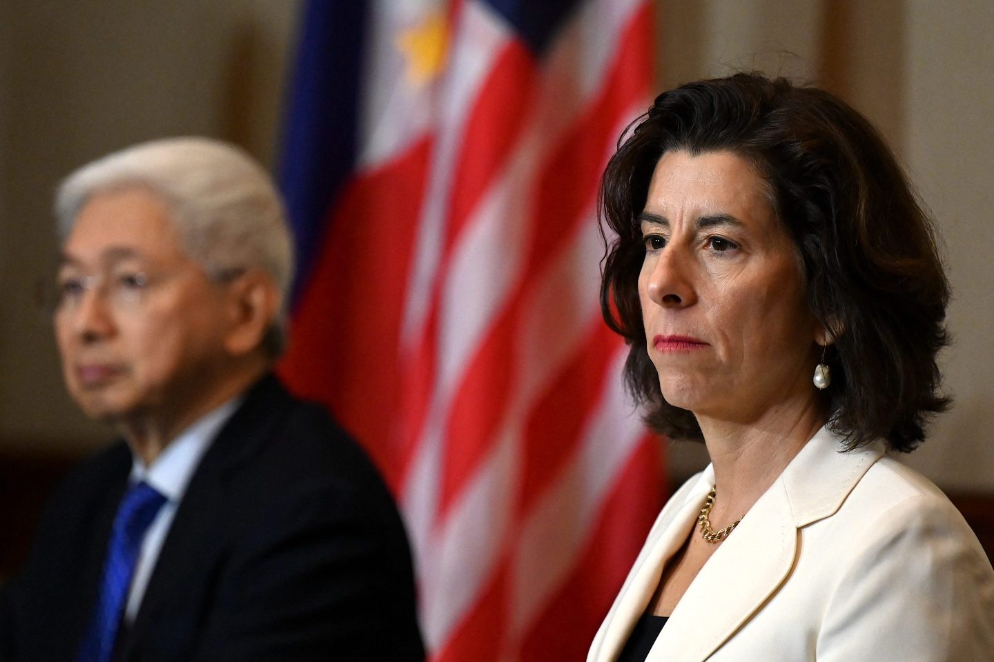 U.S. Commerce Secretary Gina Raimondo (R) attends a press conference with Philippine Department of Trade and Industry Secretary Alfredo Pascual in Paranaque City on March 11, 2024.