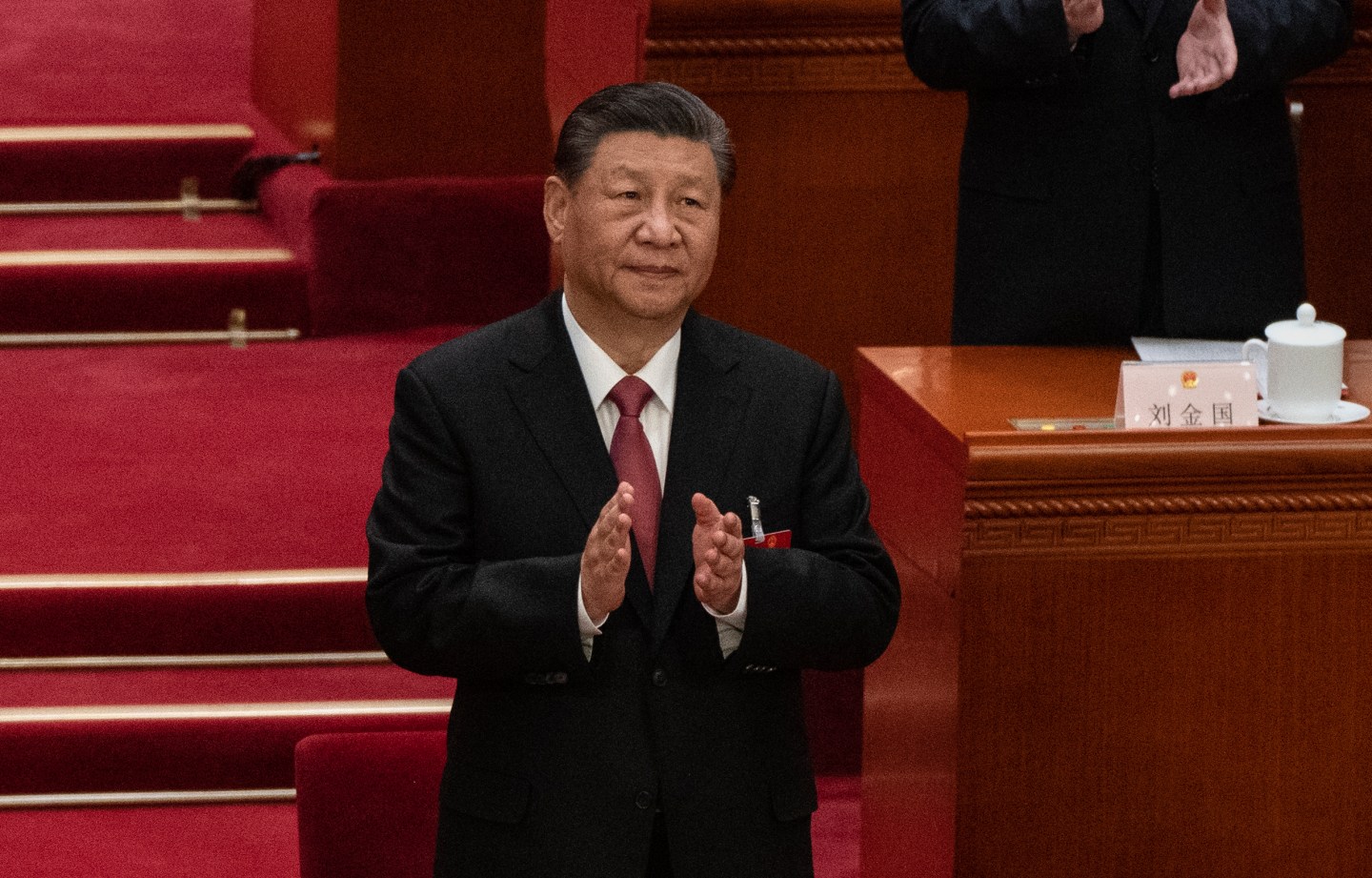 Chinese President Xi Jinping, applauds at the closing session of the NPC, or National Peoples Congress at the Great Hall of the People on March 11, 2024 in Beijing.