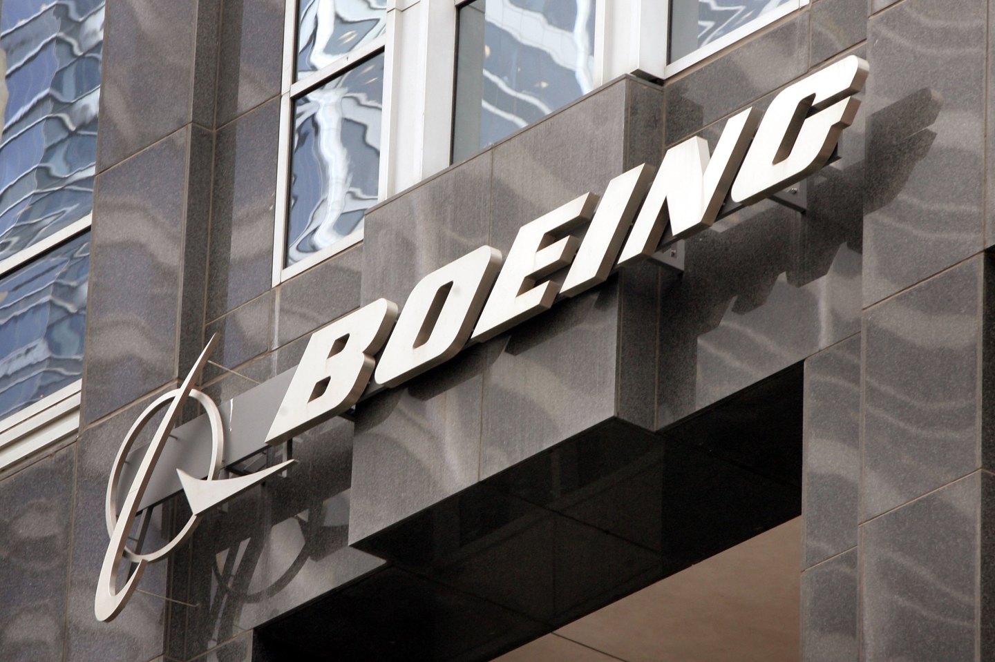 Photo of the Boeing logo on the side of a building