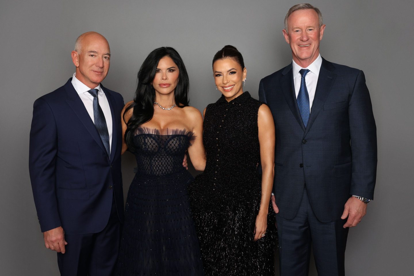 From left to right: Jeff Bezos, Lauren Sánchez, Eva Longoria, and Bill McRaven