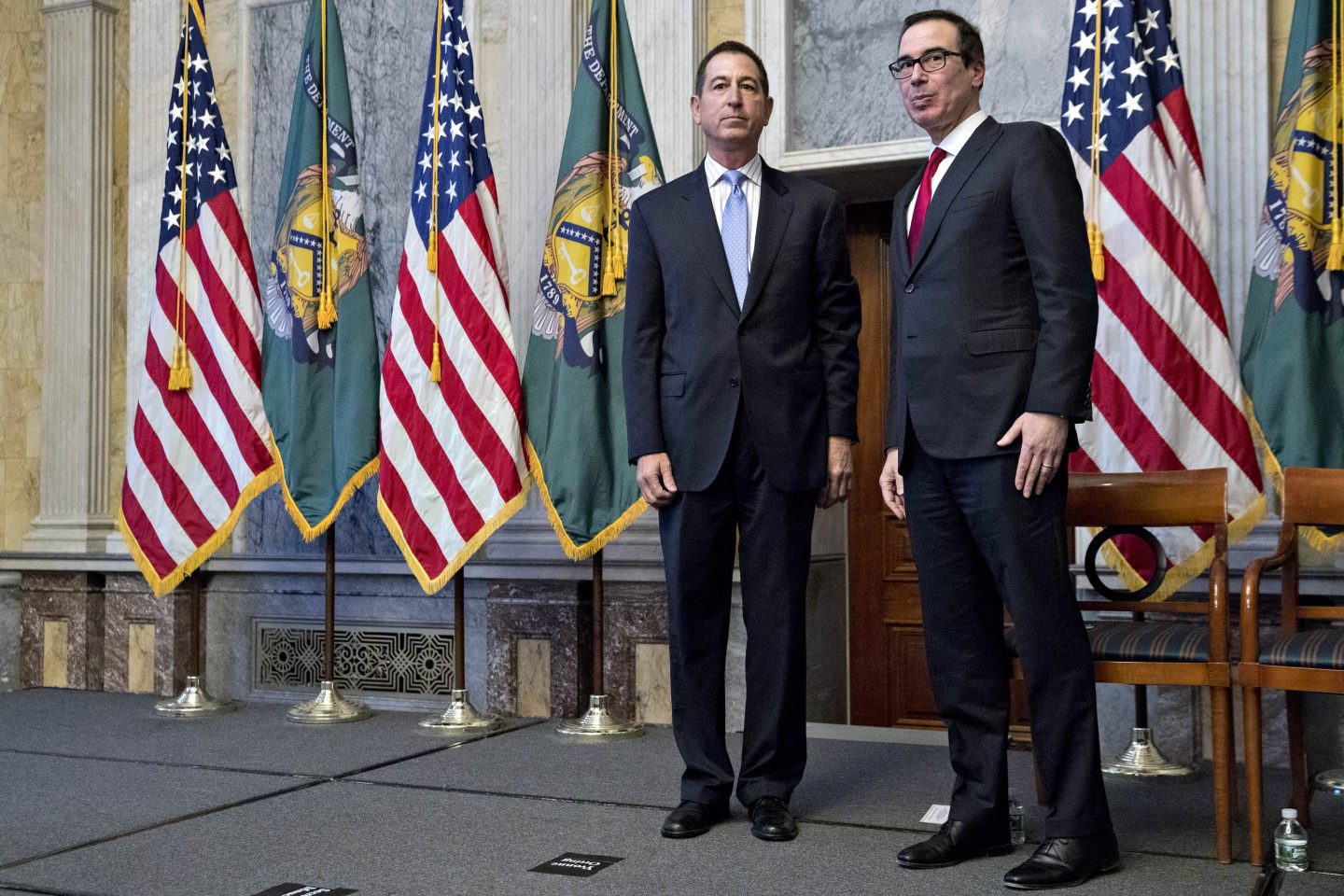 Joseph Otting (left) and Steven Mnuchin at a 2017 swearing-in ceremony in Washington.