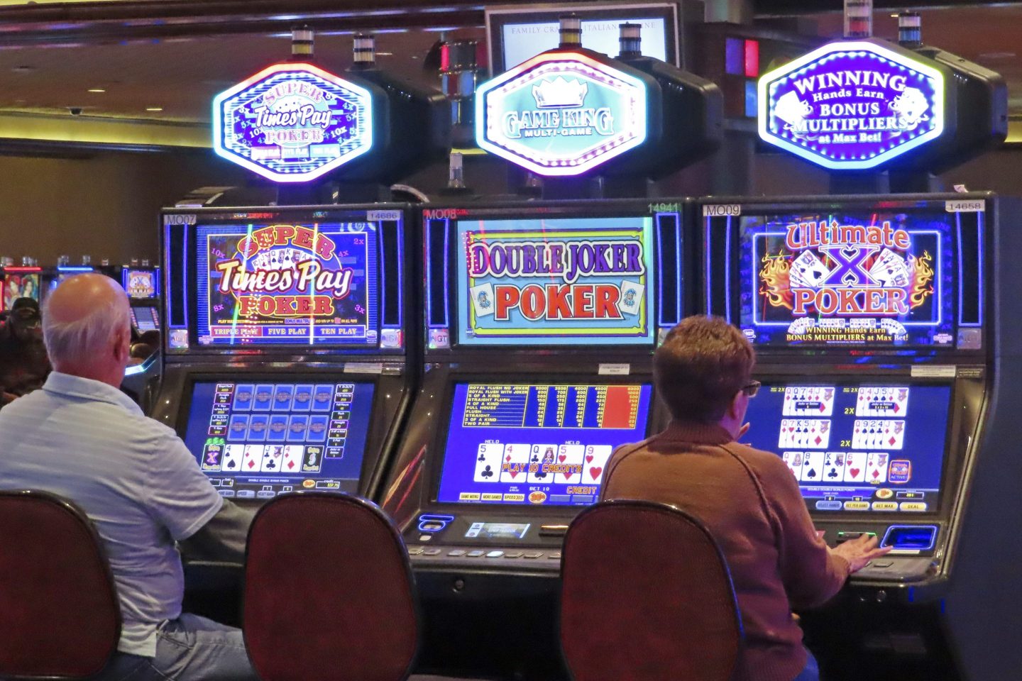 Gamblers play slot machines at Harrah's casino in Atlantic City, on  Sept. 29, 2023.