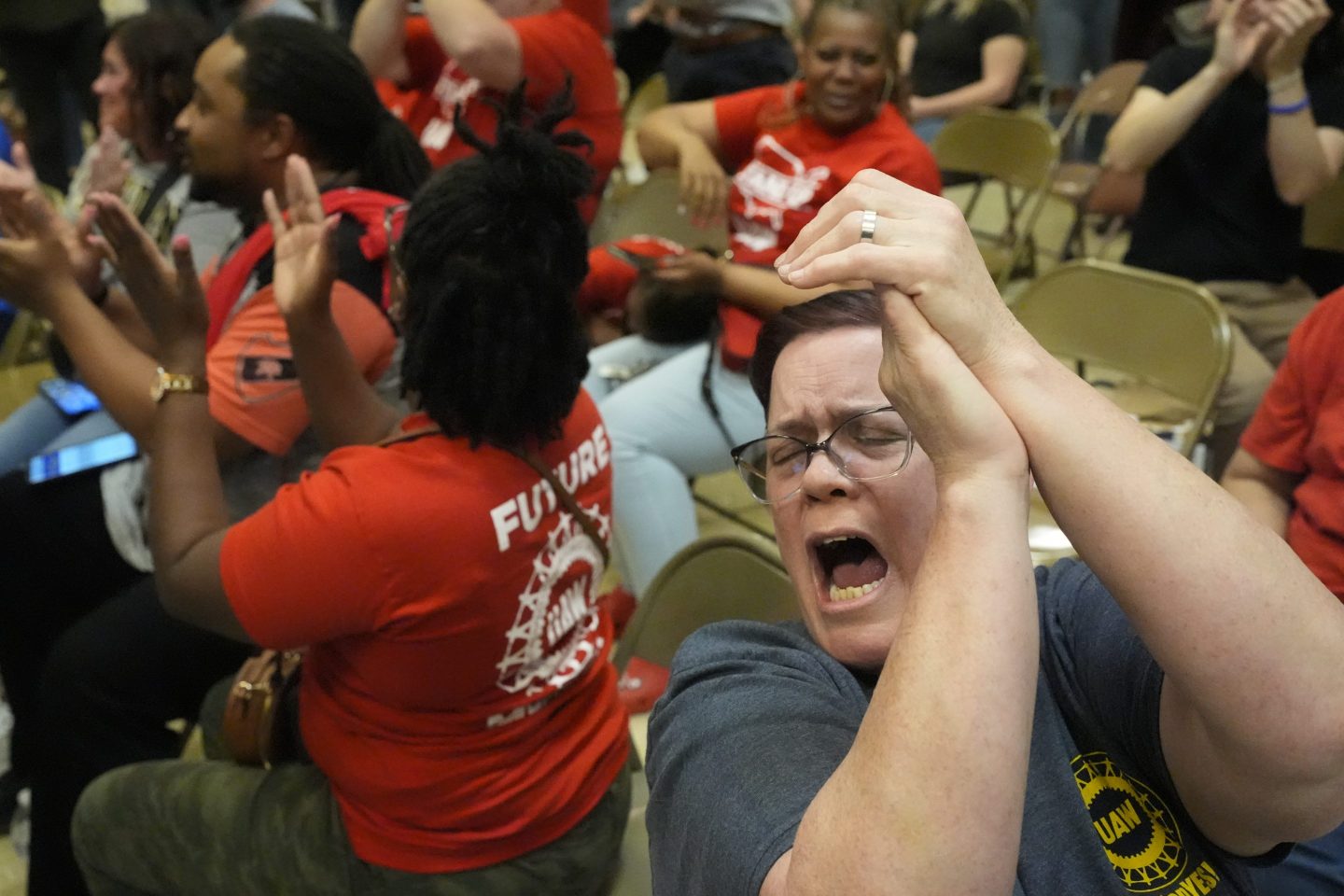 Volkswagen automobile plant employee Stephanie Romack celebrates after employees voted to join the UAW union Friday, April 19, 2024, in Chattanooga, Tenn.