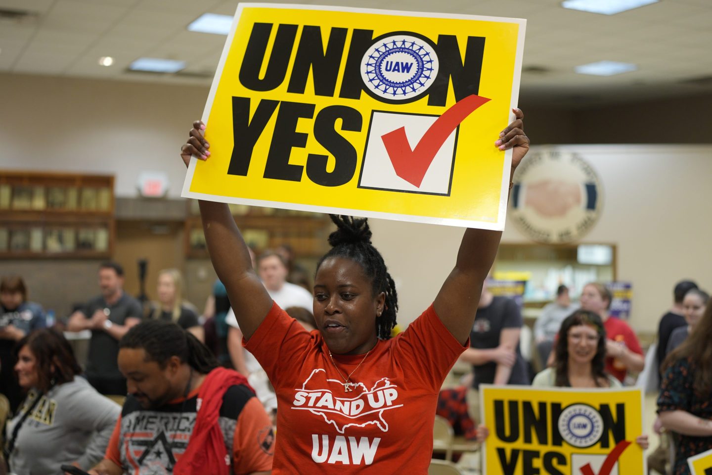 union members holds sign